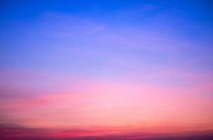 beautiful gradient orange and ranibow colour clouds and sunlight on the blue sky perfect for the background, take in everning,Twilight photo