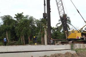 Gorontalo, Indonesia - January 2023 - Projects of river widening and the construction of dykes around the Limboto lake area photo