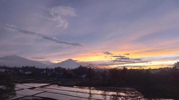 Sunrise with mountain view background, Mount Merapi and Merbabu Indonesia photo
