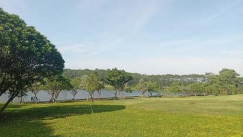 Park landscape view with lake  in Semarang Indonesia photo