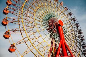 Vintage Ferris Wheel on Blue Sky photo