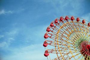 Vintage Ferris Wheel on Blue Sky photo