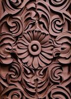 Decorative Architecture Elevated by Wooden Floral Engraving photo