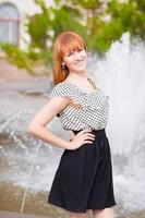 Pretty redhead woman photo