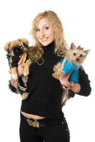 Portrait of smiling young blonde with two dogs photo