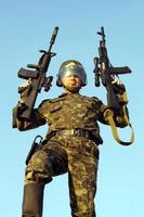 Army soldier with machine gun photo