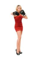 Blond young lady in  boxing gloves photo