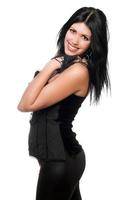 Portrait of a cheerful brunette in black clothes photo