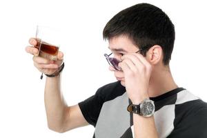 Young man with a glass photo