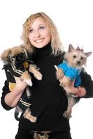 Portrait of smiling pretty blonde with two dogs photo