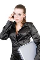 Businesswoman with laptop and phone over white photo