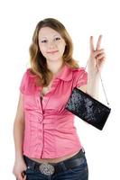 Beautiful smiling girl with a handbag. Isolated photo