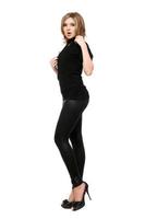 Pretty young woman in leggings. Isolated on white photo