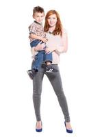 Redhead woman posing with a little boy photo