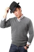 Young handsome man wearing black hat photo