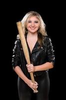 Cheerful young blonde with a bat photo