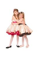 Two attractive little girls in a dress photo