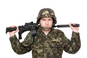 soldado con m16 en los hombros foto