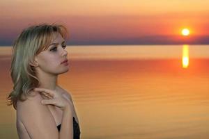 young blonde at sunset photo