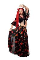 Dancing gypsy woman in a black skirt. Isolated photo