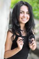 Portrait of pretty joyful brunette photo