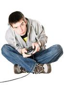 Young man with a joystick photo