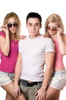 two sensual blonde women with handsome young man photo