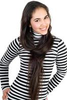 Playful pretty girl in striped blouse. Isolated photo