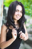 Portrait of pretty smiling brunette photo