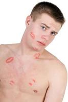 Portrait of the young man in lipstick photo