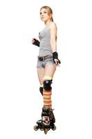 Pretty young blonde on roller skates photo