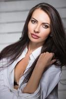 Portrait of sexy young brunette photo