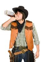 Cowboy drinking whiskey photo