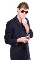 Man in sunglasses and jacket photo