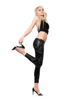 Playful young blonde in black leggings photo