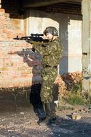 Army soldier with machine gun photo