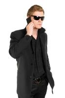 Man in sunglasses with a mobile photo