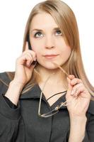 Close-up portrait of thoughtful attractive blonde photo