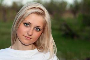 Closeup portrait of young lovely blonde photo