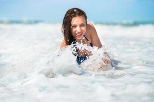 Smiling playful brunette photo