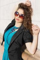 Curly brunette sunglasses photo