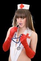 Portrait of the sexy nurse with a stethoscope photo