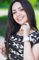 Portrait of cheerful young brunette photo