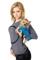 Beautiful blonde posing with puppy. Isolated photo