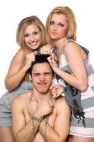 Two playful blonde and a guy in chains photo