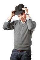 Attractive young man wearing black hat photo