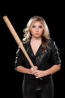 Upset girl with a bat in their hands photo