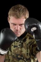 young man in boxing gloves photo