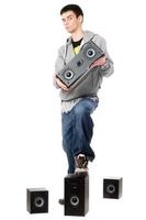 Young man with a four speakers photo