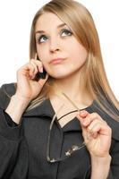 Close-up portrait of thoughtful young blonde photo